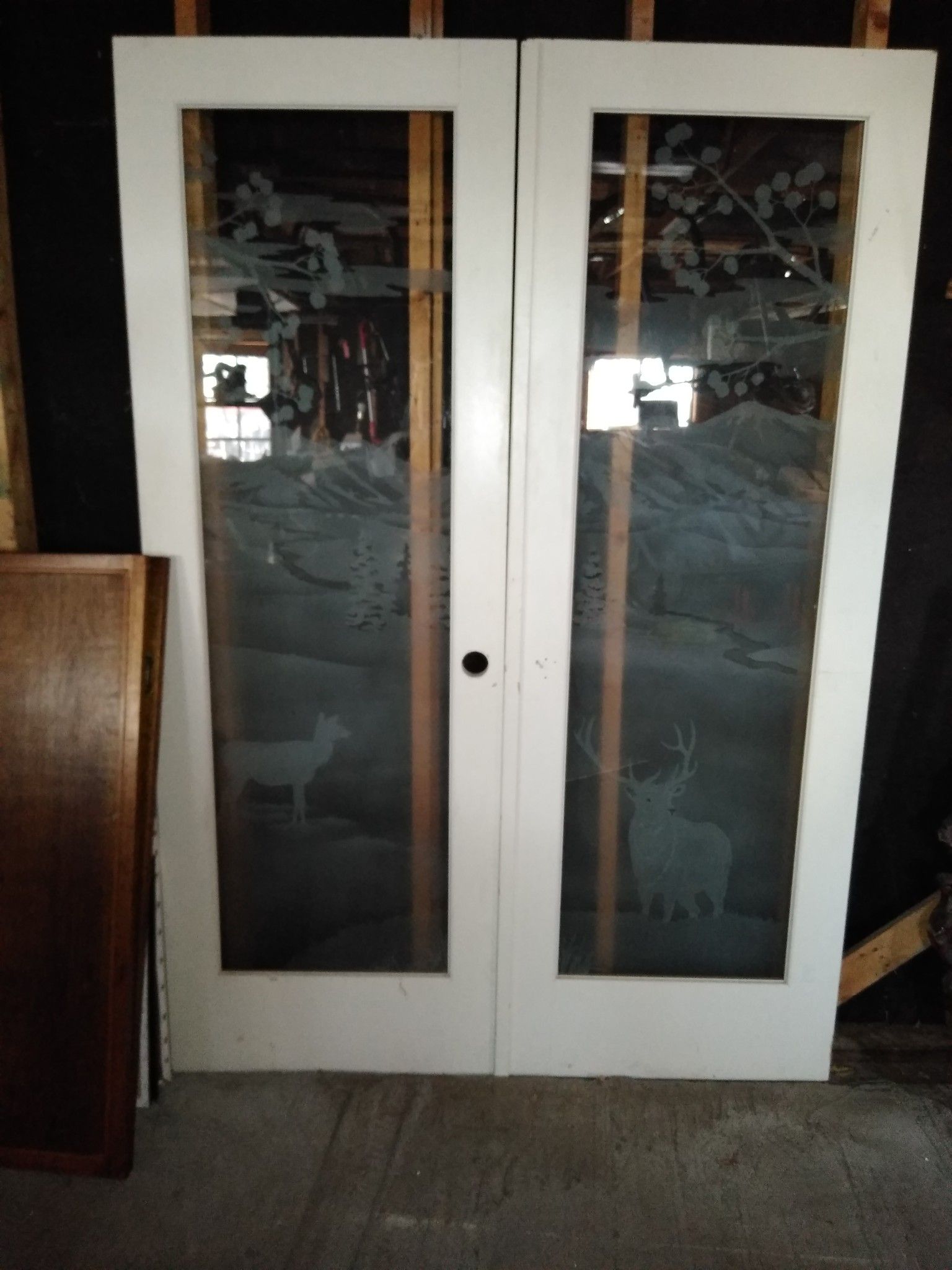 Two beautiful glass etched doors one female elk and one a male elk high quality work