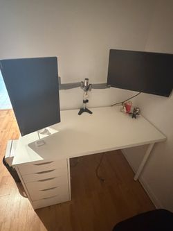 desk with monitors