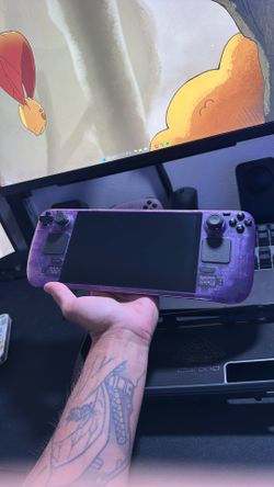 Atomic Purple Steam Deck OLED 1TB with Dock and 250gb SD card