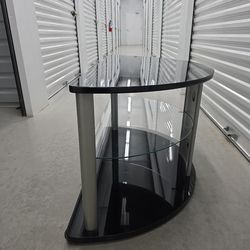 Tv stand holds up to 42 in Tv. Cash Only