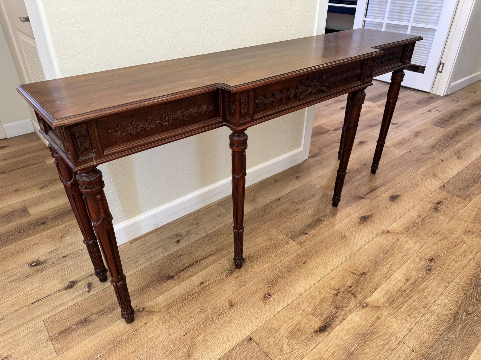 Ornate carved wood console table – elegant hall/office piece