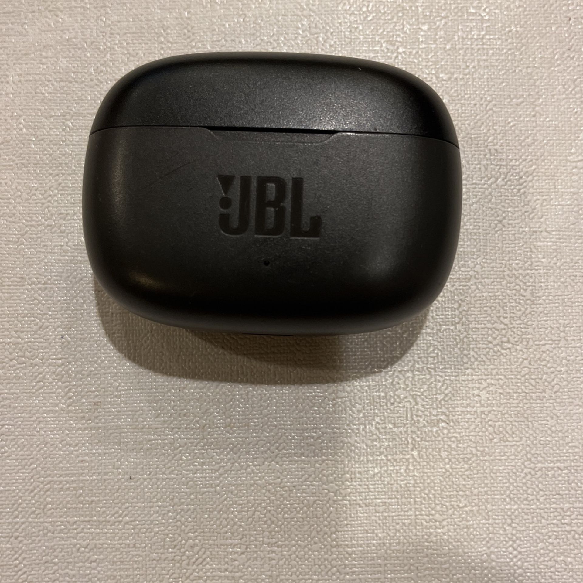 JBL wireless headphones and charger