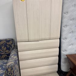 light-colored wood armoire with five drawers and a top cabinet  - 36” x 22” x 71”