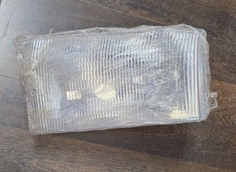 USED REF#1440 1991-2001 FORD F-250 DRIVER SIDE HEADLIGHT
