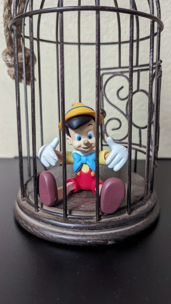 Pinocchio In a cage