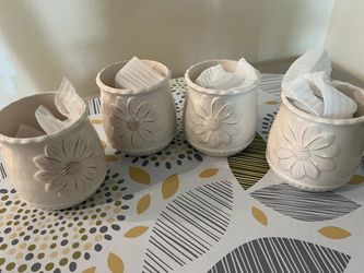 Embossed white ceramic vases