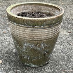  rustic mat finish green and cream, heavy ceramic pot filled with organrustic mat finish green and cream, heavy ceramic pot filled with organic soil