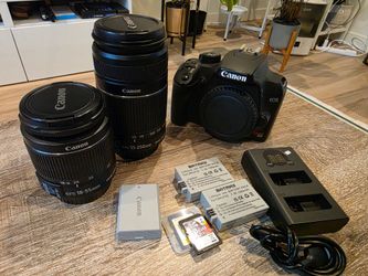 Canon EOS Rebel XS w/ 18-55/55-250mm lens and batteries and charger