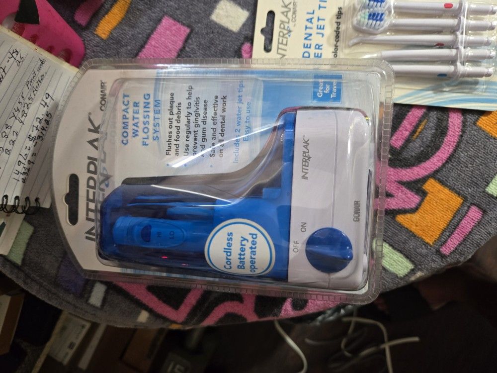 Conair Interplak Compact Water Flossing System.