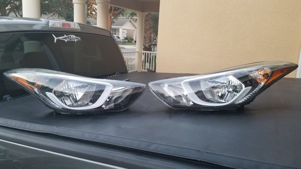 2011 - 2016 Hyundai Elantra USED pair Headlights