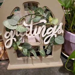 12$ Greetings Sign.