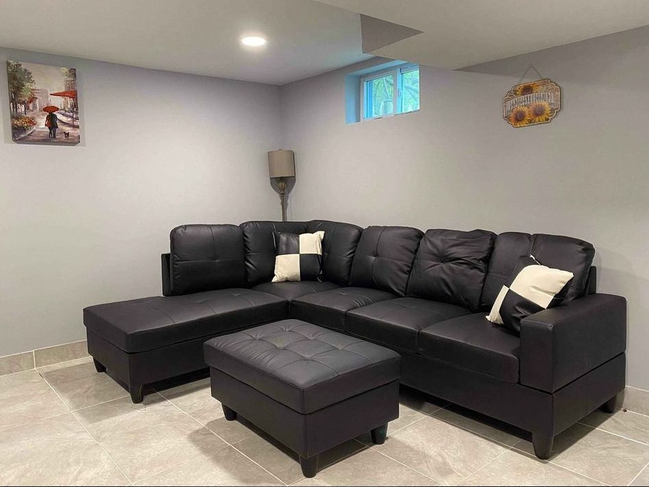 Free local delivery black sectional with storage ottoman and pillows