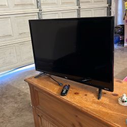 TCL roku TV (with remote) 