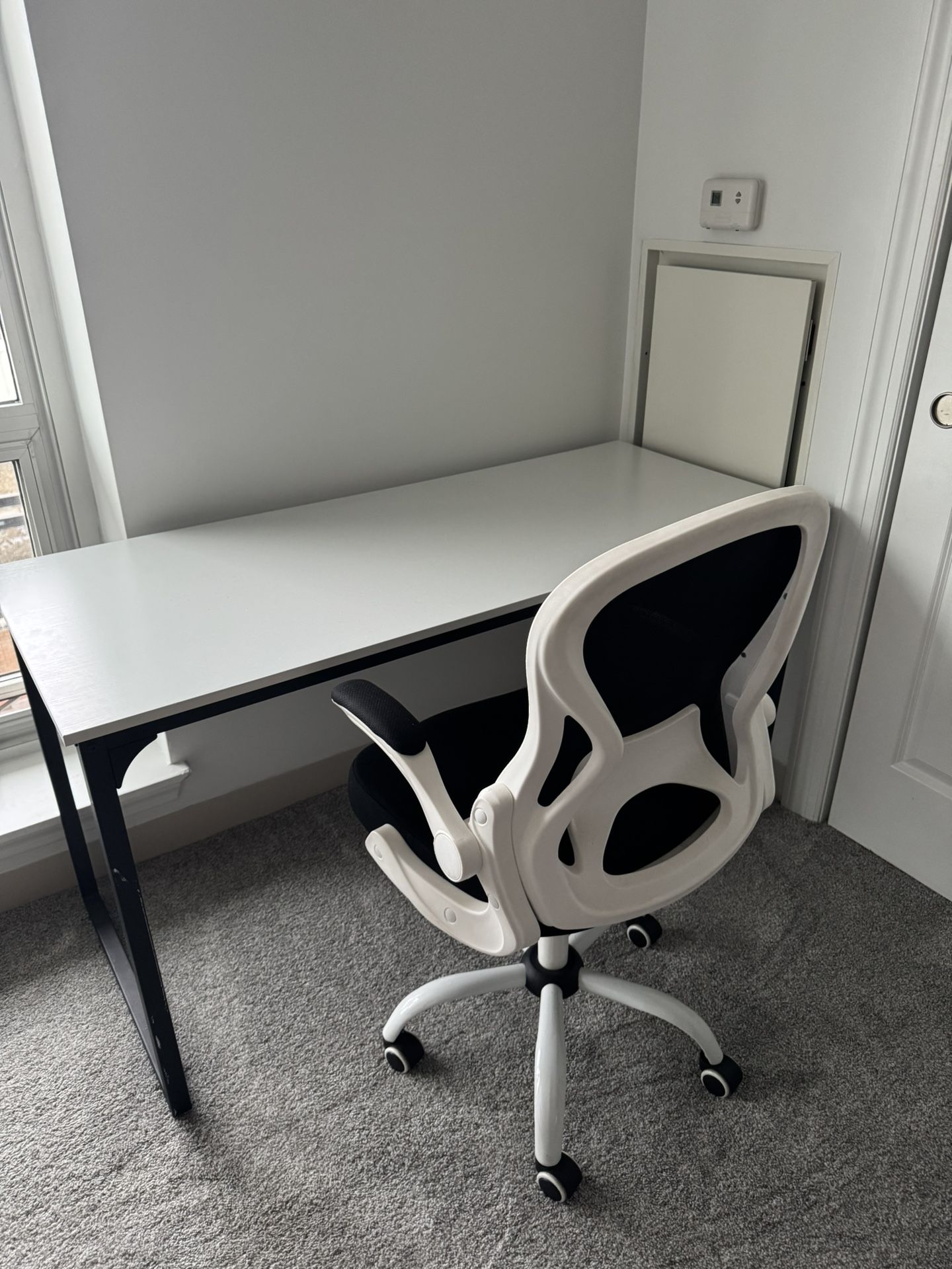 Office desk, size 24x55, and chair, in excellent condition, all for $100.