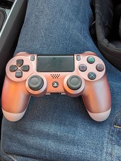 PS4 with pink controller