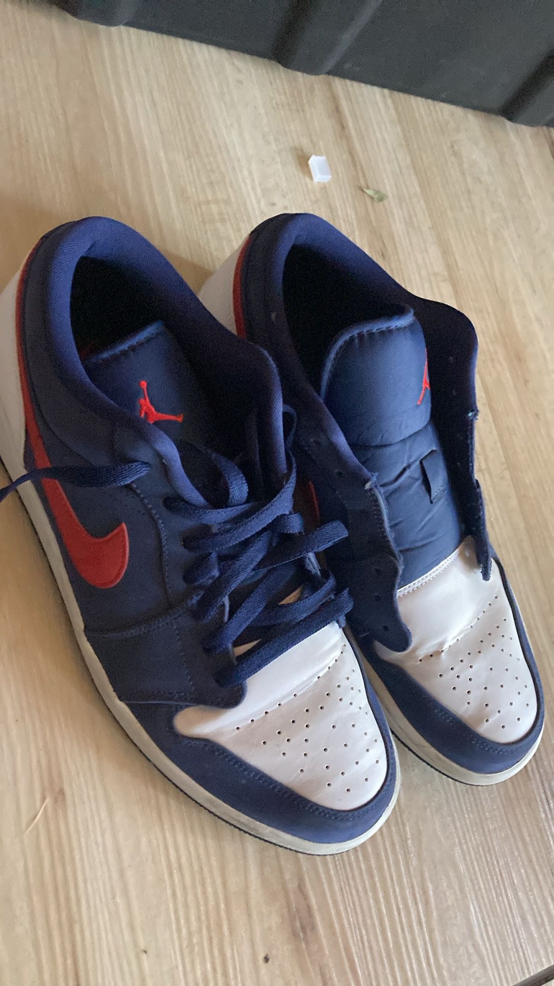 This sleek pair of Air Jordan Low USA sneakers embraces the