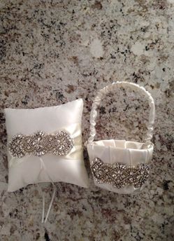 Flower girl basket and ring bearer pillow. Used in a very elegant wedding. Hand made. No stains, very clean!!