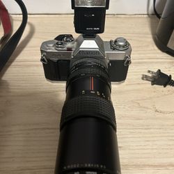 Canon AV-1 WITH lENS And flash 