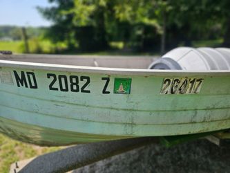 Boat motor trailer