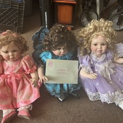 3 Porcelain dolls