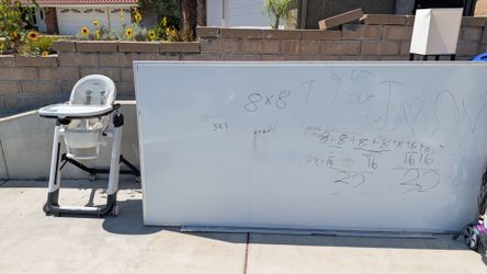 Free white board, half moon kids table, chairs.