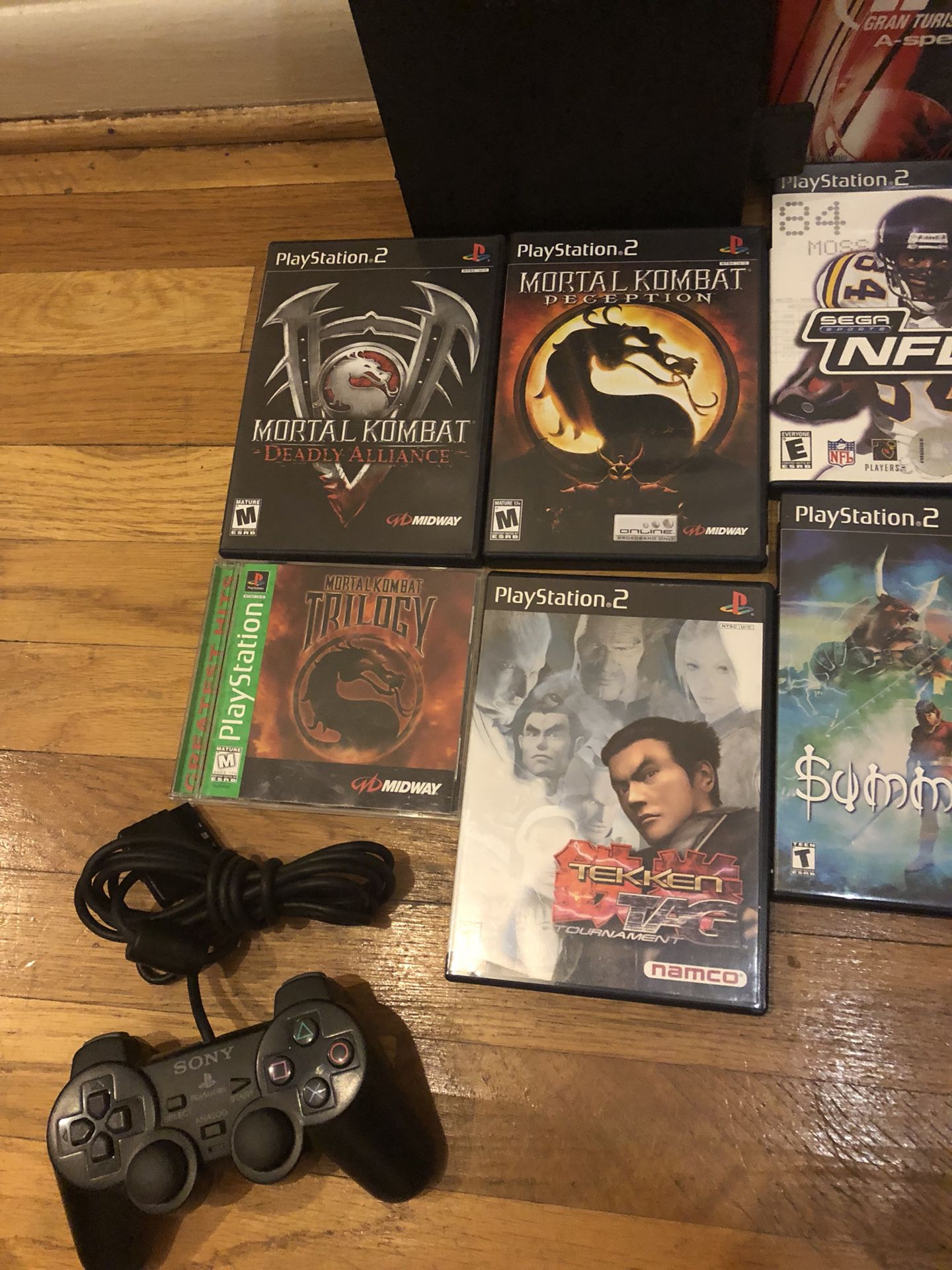 Playstation 2 and 16 games.