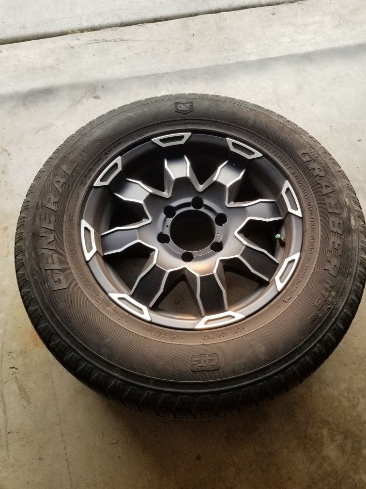 Toyota wheels and tires w/ general grabber