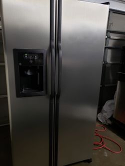 Ge refrigerator stainless steel side by side in good condition