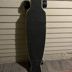 This long skateboard features a smooth, stable ride with a durable wood deck, strong trucks, and soft, grippy wheels. Perfect for cruising, carving, o