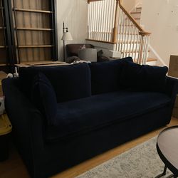 Blue Velvet Couch With A Pullout Bed
