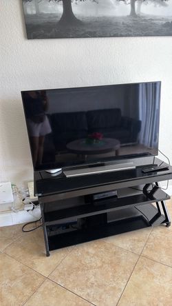 Large Flat Screen TV with TV stand