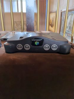 Nintendo 64 Console Bundle + 3 OEM Controllers + 9 Games – $375