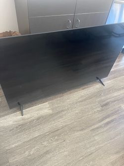 TCL flat screen 70 inches