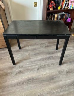 Black desk table with drawer