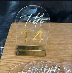 Gold table signs