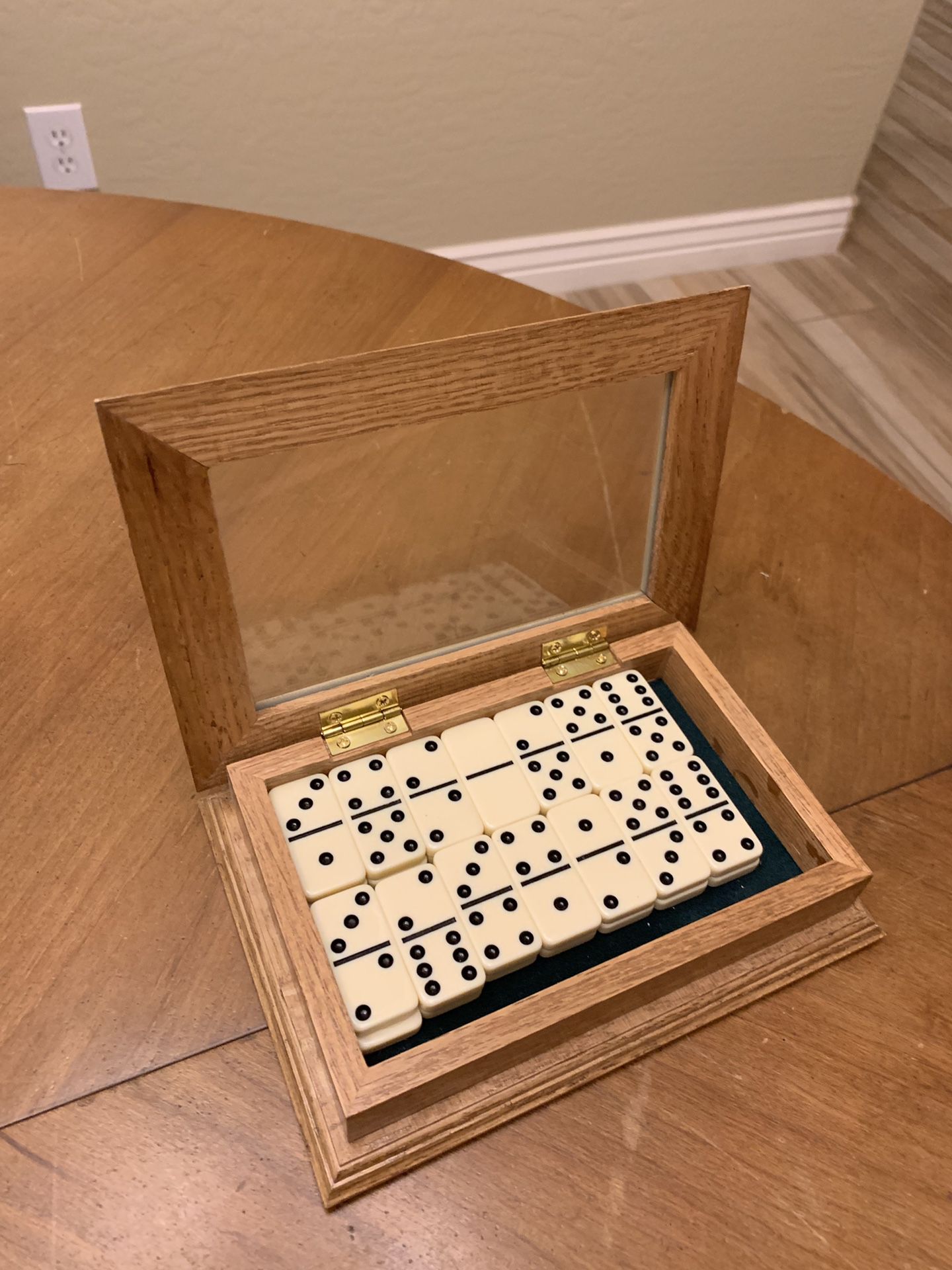 Dominos set in wood and glass case