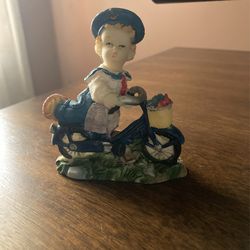 Boy Riding Bike Figurine ($11 OBO)