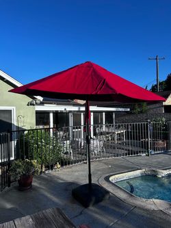 Tilting outdoor umbrella
