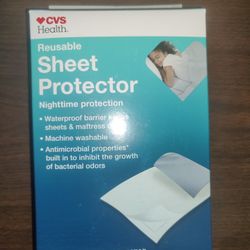 NEVER USED.  30 In x 34 In Antimicrobial Reusable Bed Sheet Protector For Kids Or Adults 