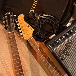 Two Electric Guitar With A Amplifier