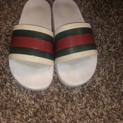 white signature gucci slides