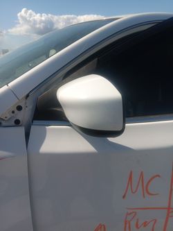 Driver side Mira 2015 Nissan Central.