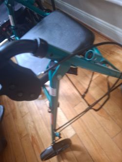 Walker with wheels and seat