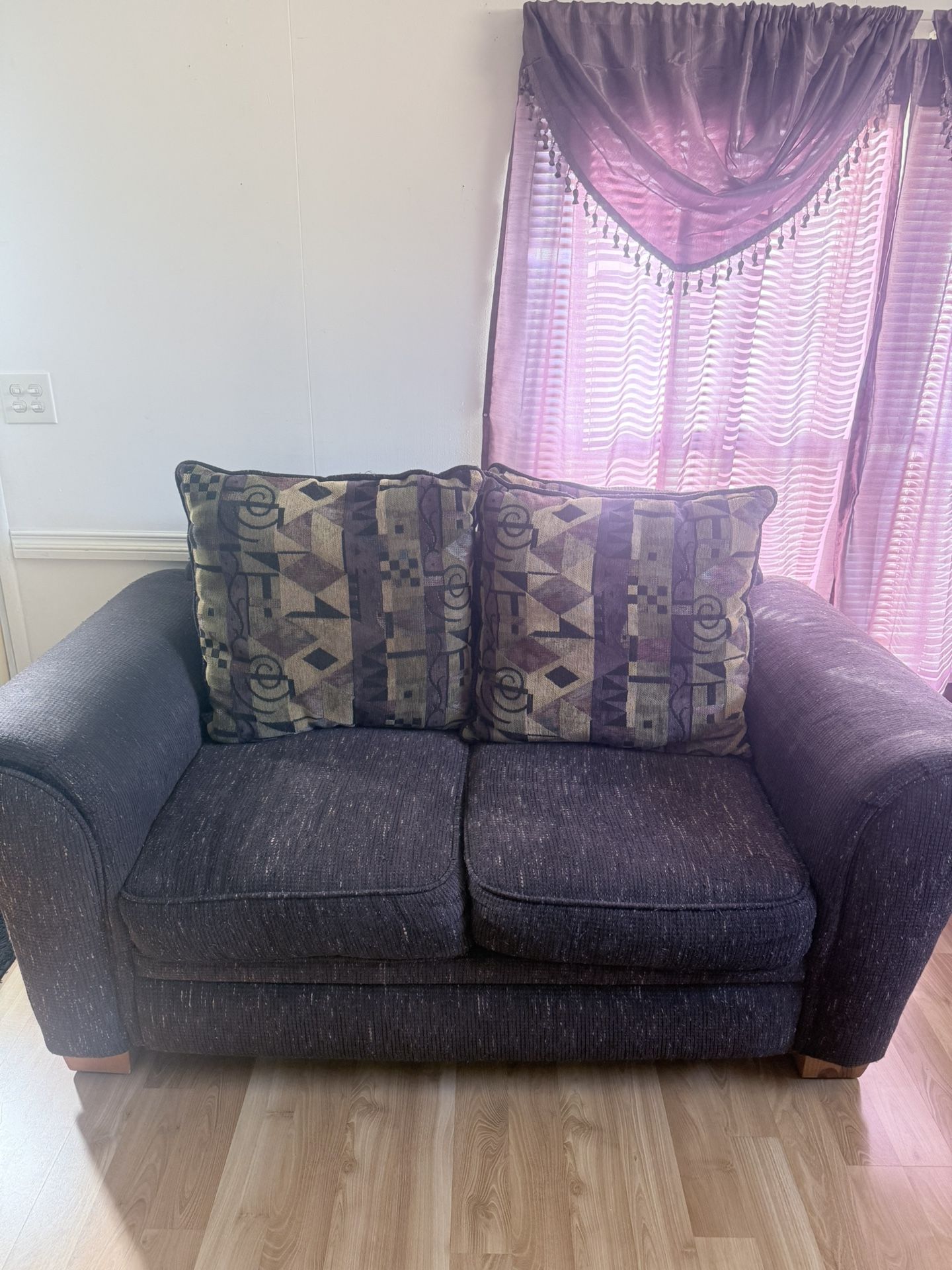 Vintage Purple Love Seat with Colorful Patterns