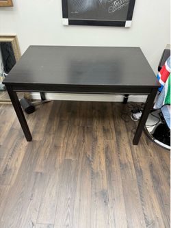 Black table no chairs