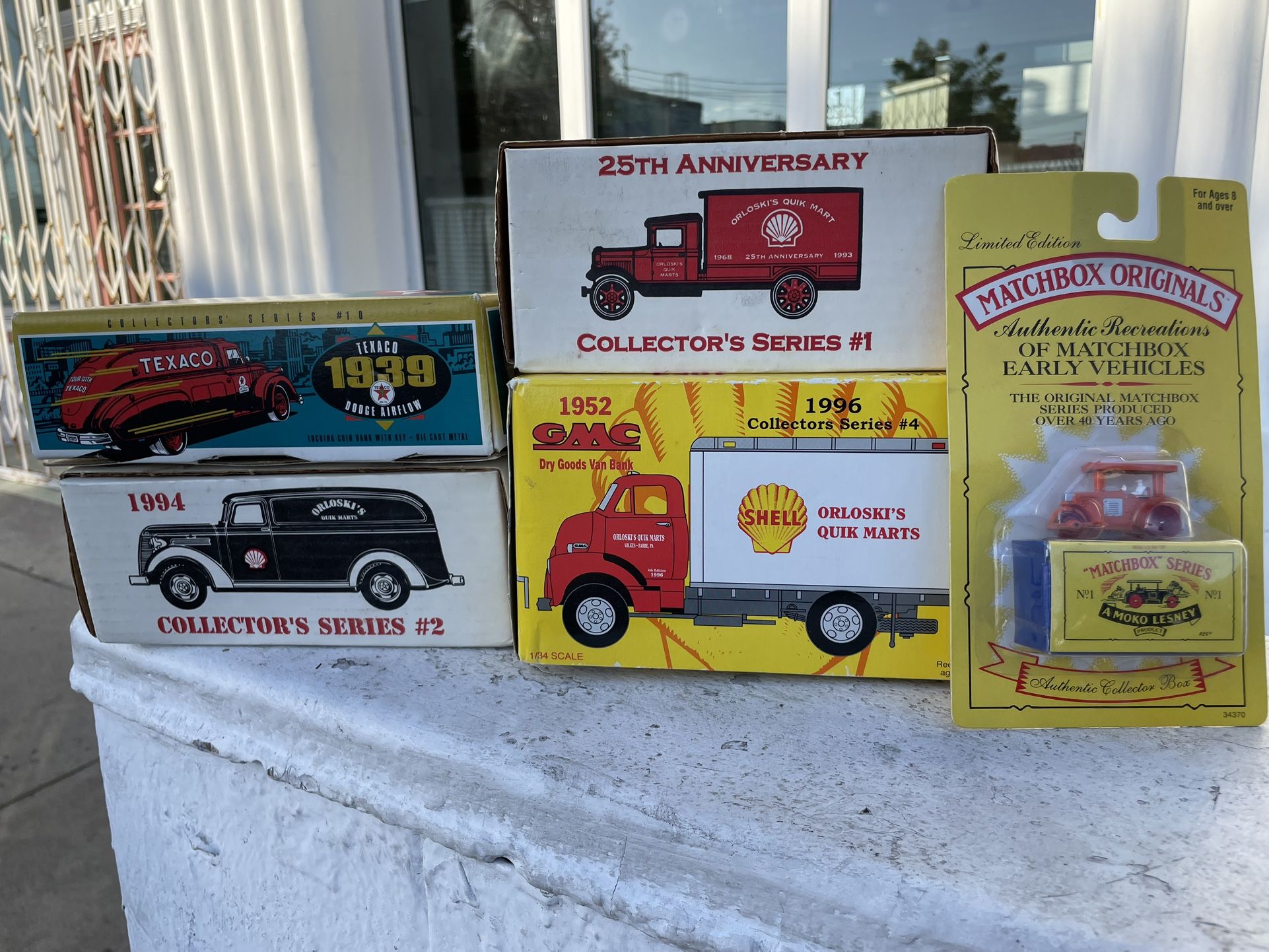 Collection Of Ertl, Texaco, Shell, Matchbox Toy Trucks In Original Boxes