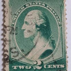 1883-88 Scott #213 George Washington Green 2-Cent Stamp Perf 12 Post Marked Canceled. The 1883-88 stamp series, also known as the "New Rates & Designs