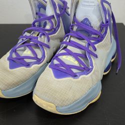 Used Nike LeBron 19 GS "Easter" sneakers in the Aura, Citron Tint, and Worn Blue colorway.  6.5 youth size.