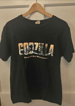 GODZILLA King of the Monsters* SZ youths Large* Graphic Spellout T Shirt Blue
Excellent condition 
No rips or stains 
Super clean 
Not faded 
Pls see 
