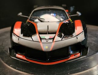 Maisto Ferrari FXX K 1/18 scale Die-cast Replica Black and Orange